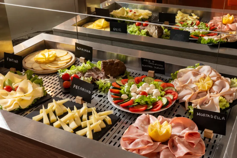 Savory breakfast buffet with cheeses, cold cuts and fresh vegetables, complete breakfast in Pisa near station - Hotel La Pace, BZAR hotels in Pisa