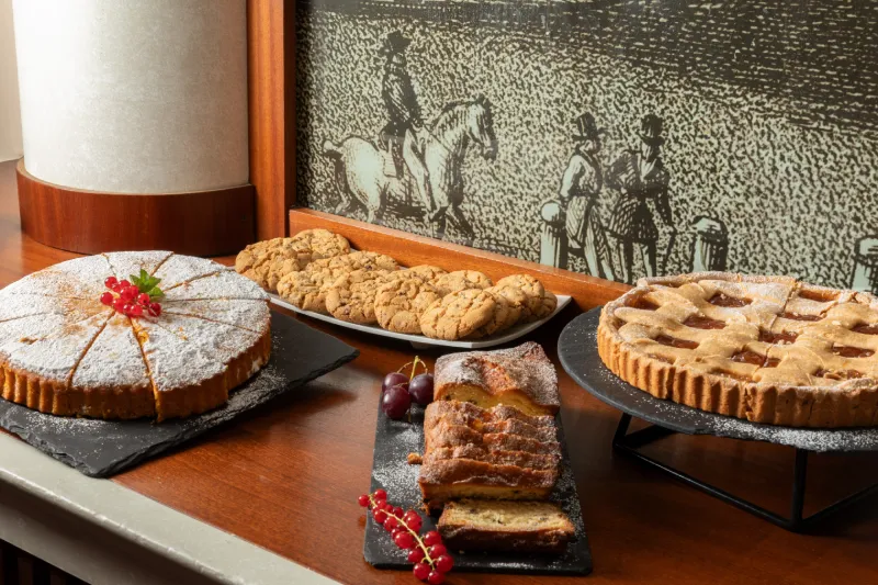 Selection of homemade cakes and fresh cookies, typical Italian breakfast in a Pisa hotel - Hotel La Pace, BZAR hotels in Pisa